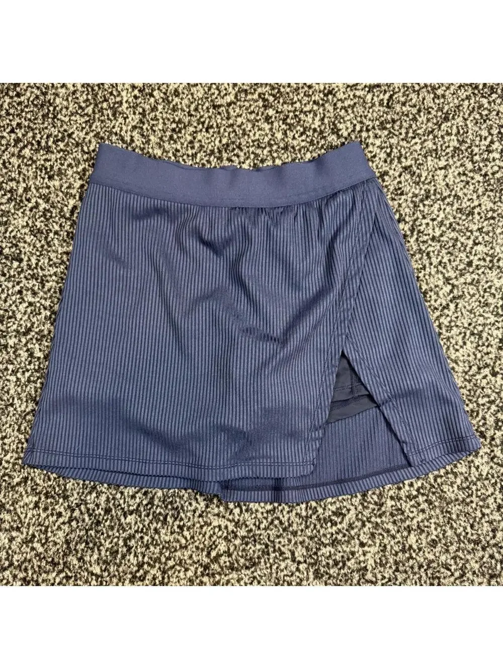 Navy blue mini skirt with thin vertical stripes